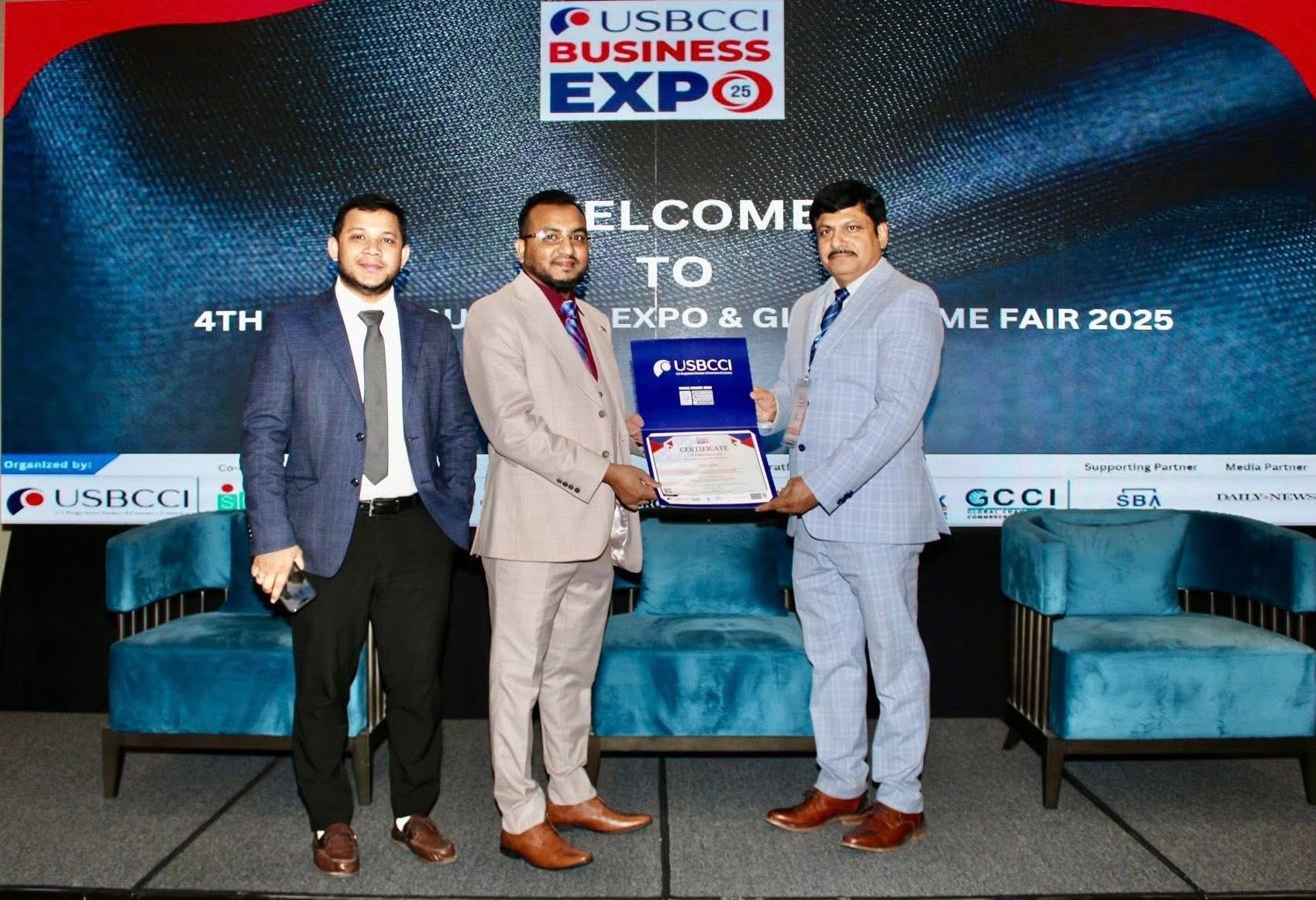 Abul Hasan Molla on stage at the 4th USBCCI Business Expo & Global SME Fair 2025 as an exhibitor certificate is presented